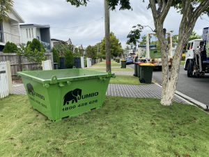 2m cubed skip bin laying on front lawn in Brisbane
